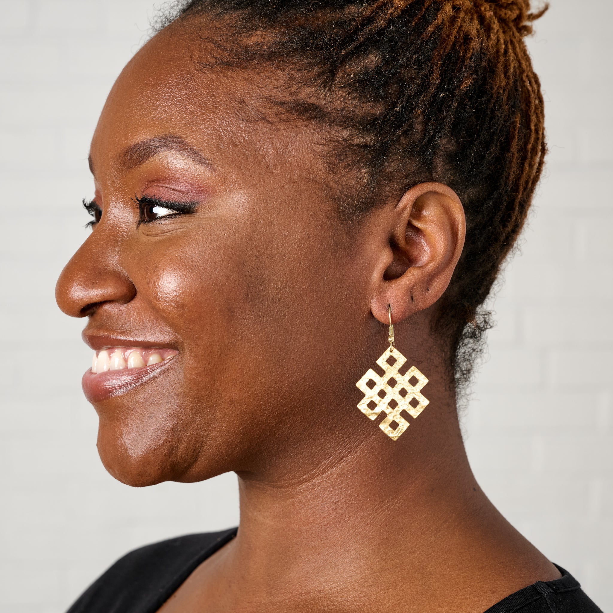 Endless Knot Hammered Brass Drop Earrings - Ten Thousand Villages