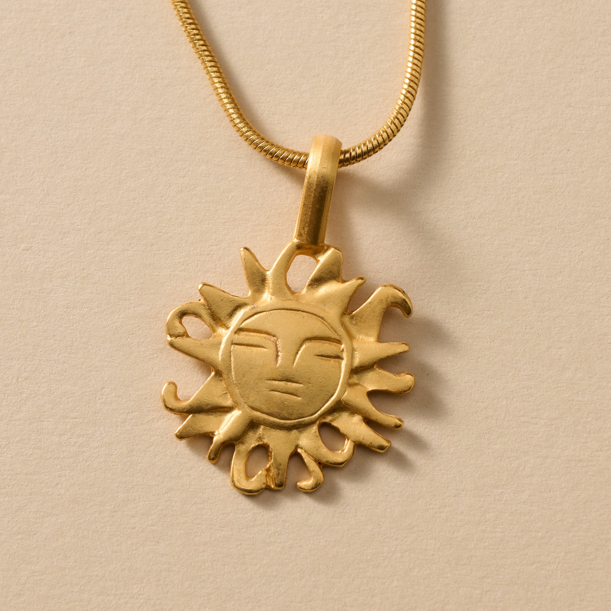 Calida Gold Plate Sun Pendant Necklace - Ten Thousand Villages