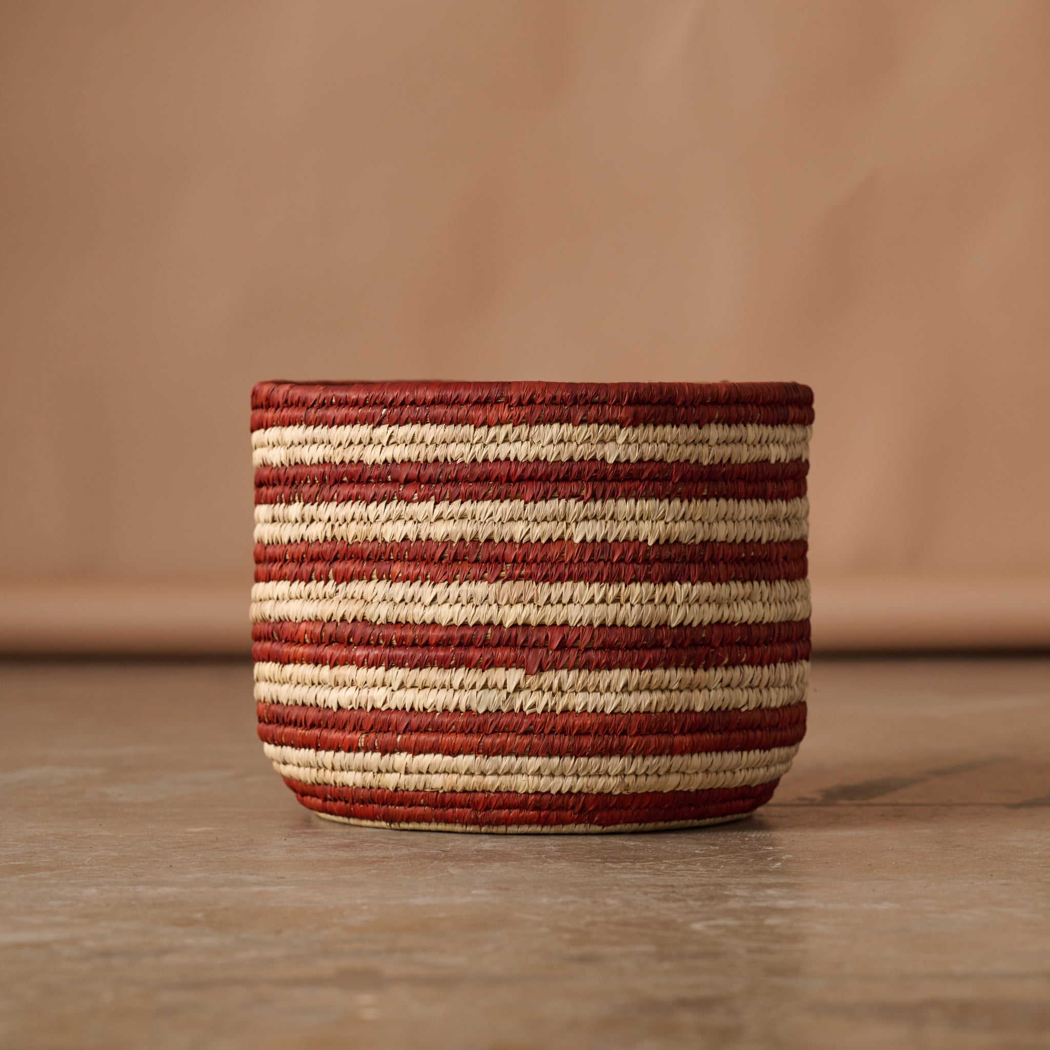 Burnt Orange Striped Palm Leaf Basket 14.5 - Ten Thousand Villages