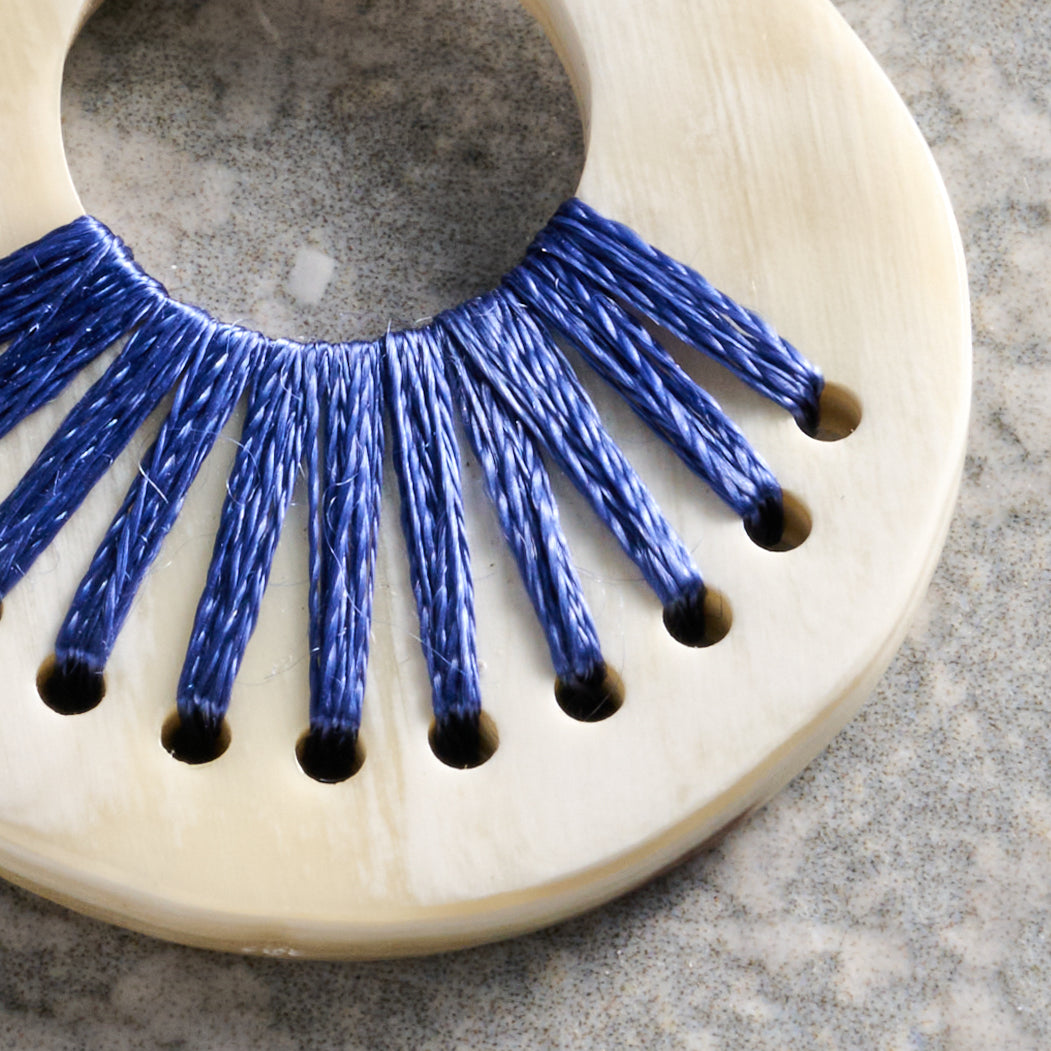 Taji Stitched Horn Earrings