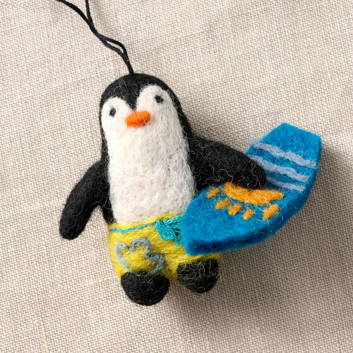 Parsi Surfing Penguin Ornament