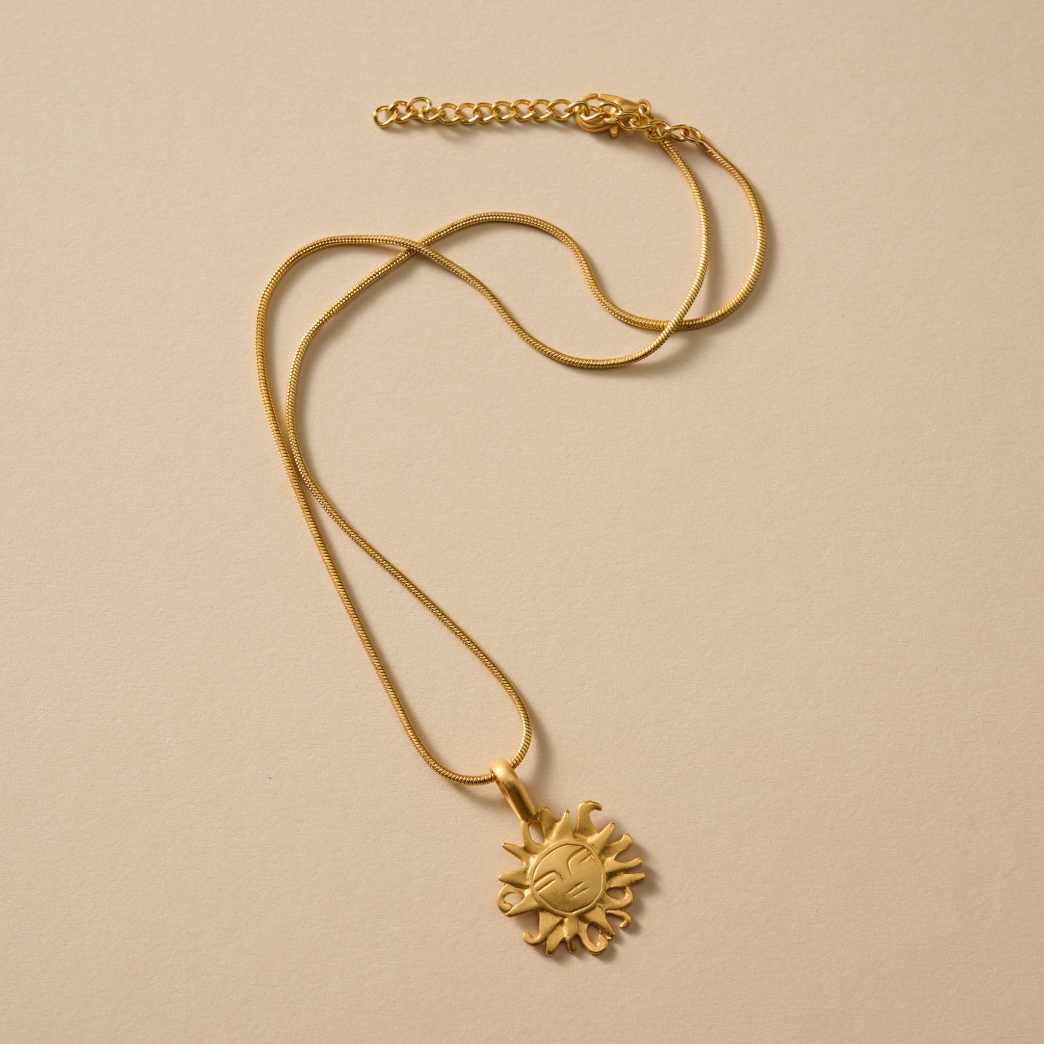 Calida Gold Plate Sun Pendant Necklace - Ten Thousand Villages