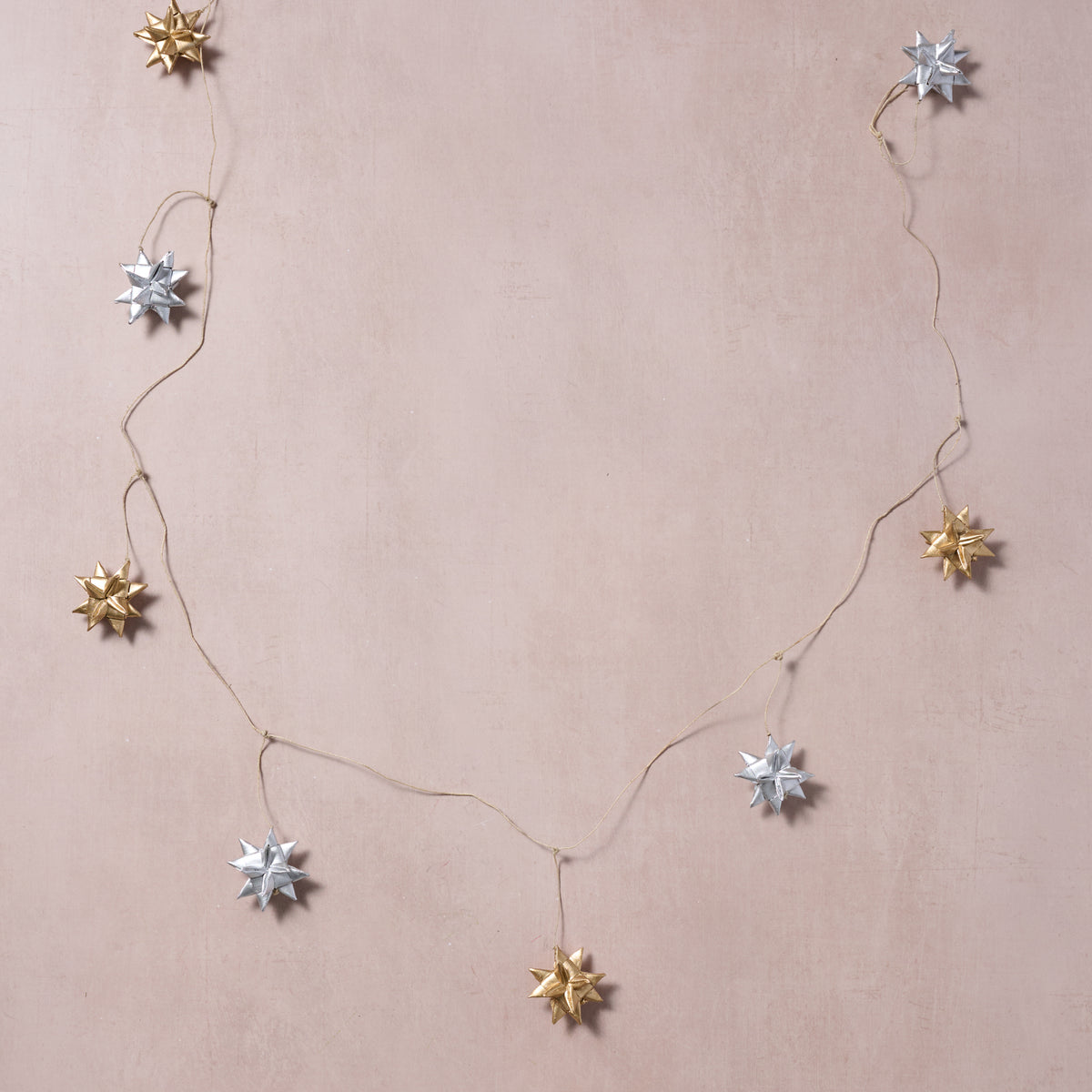 Veda Silver + Gold Metallic Star Palm Leaf Garland